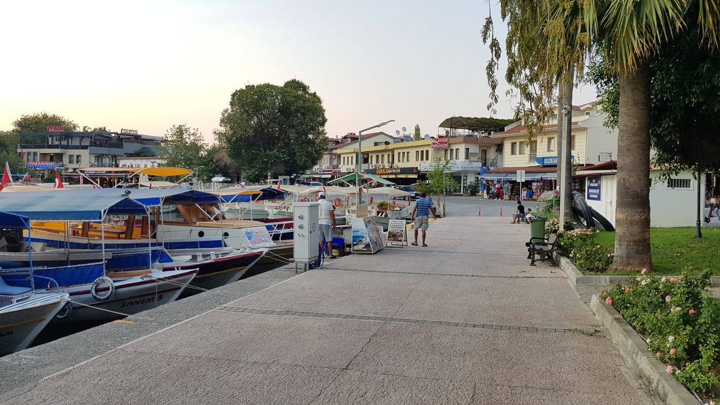 Dalyan riverside promenade with boats and restaurants